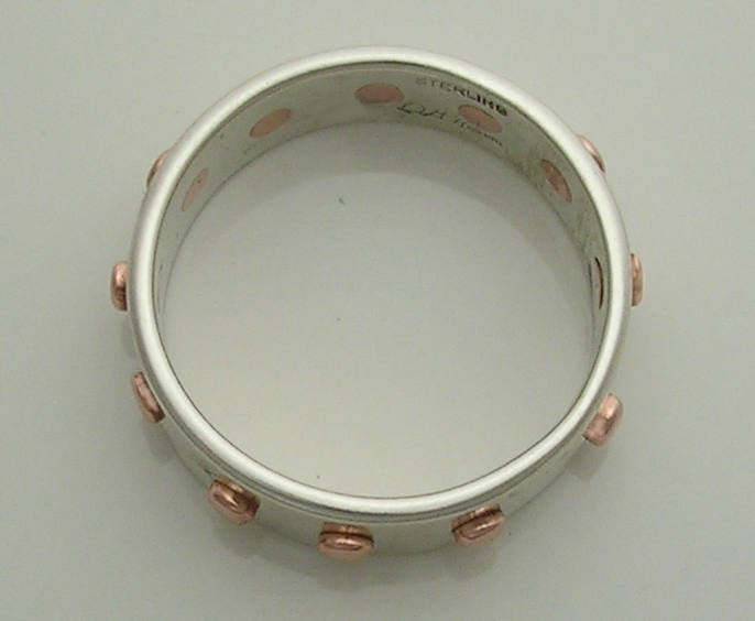 The 12 Rivet Ring