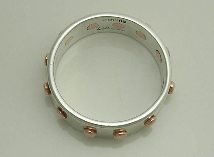 The 12 Rivet Ring