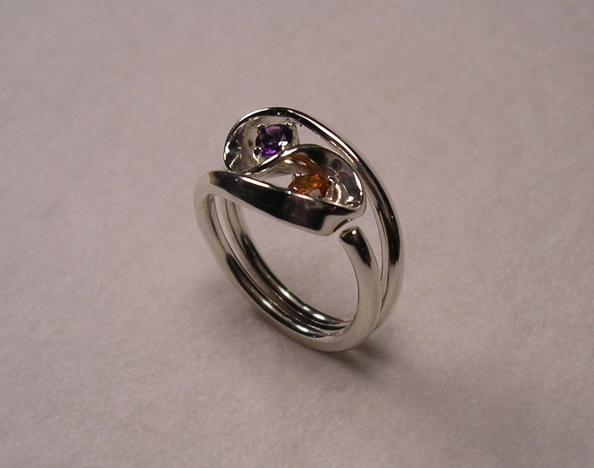 Violet Amethyst and Mandarine Garnet Set in The Two Turn Vortex Energy Rings ™ ©