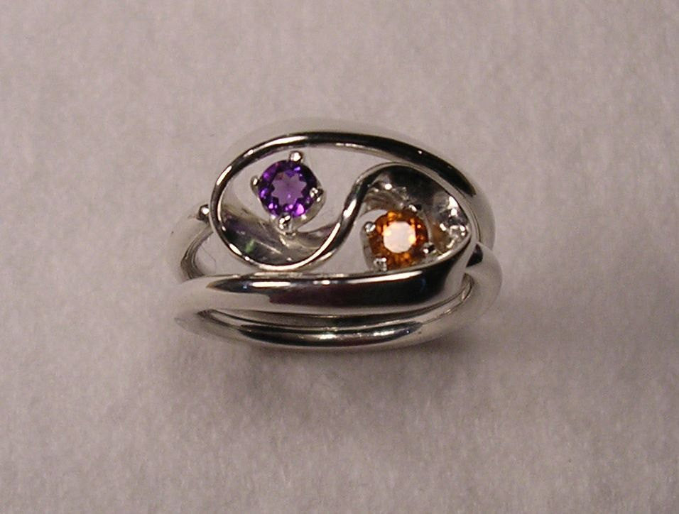 Violet Amethyst and Mandarine Garnet Set in The Two Turn Vortex Energy Rings ™ ©